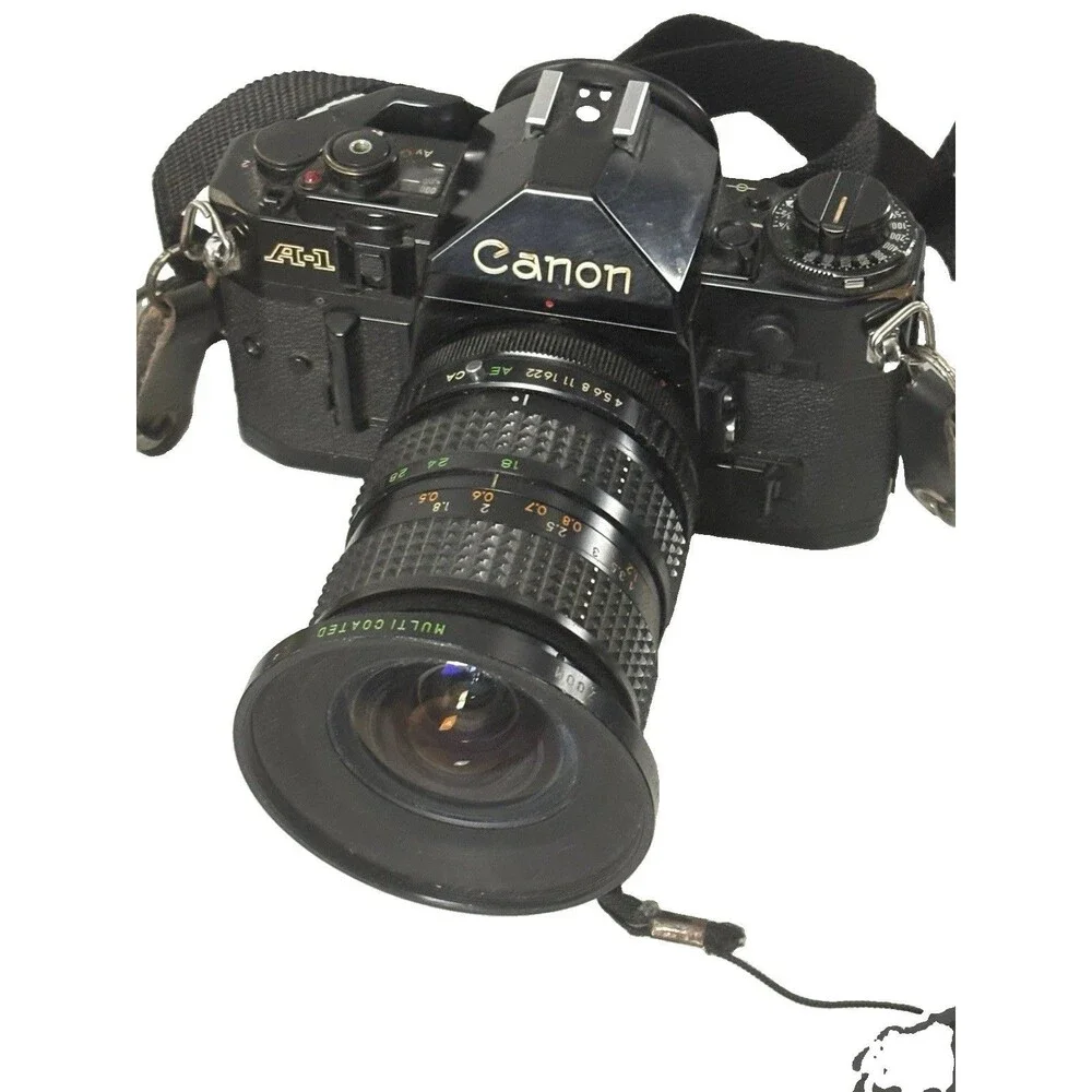 Canon A-1 35mm Film Camera with toyo optics 28mm 1:3.5 Lens and F=28-80  Tested
